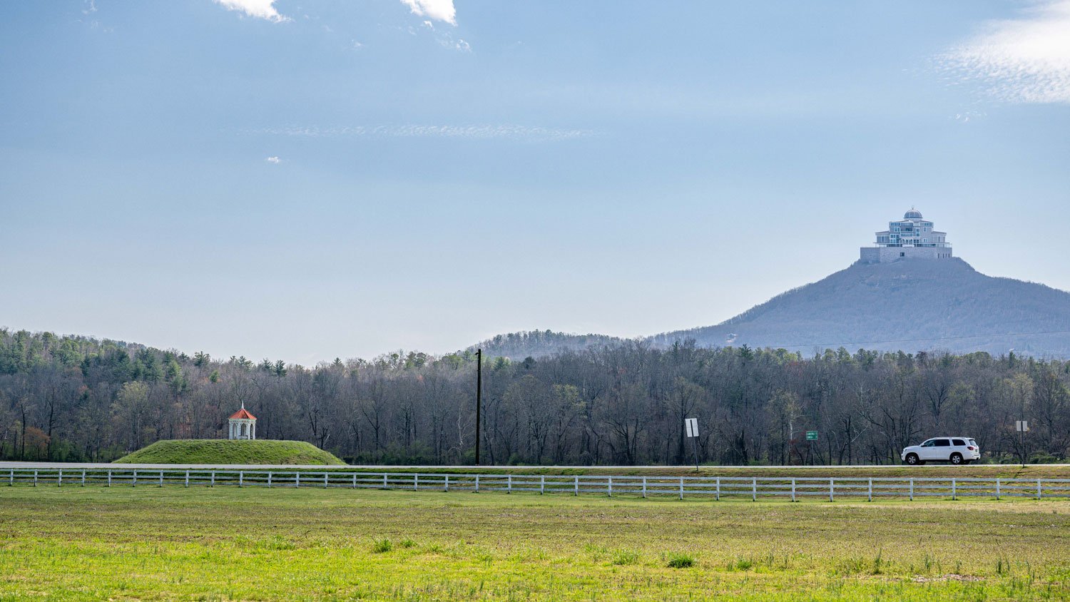 Hardman Farm below—quiet and timeless. Above it, a structure that changes the view for everyone.