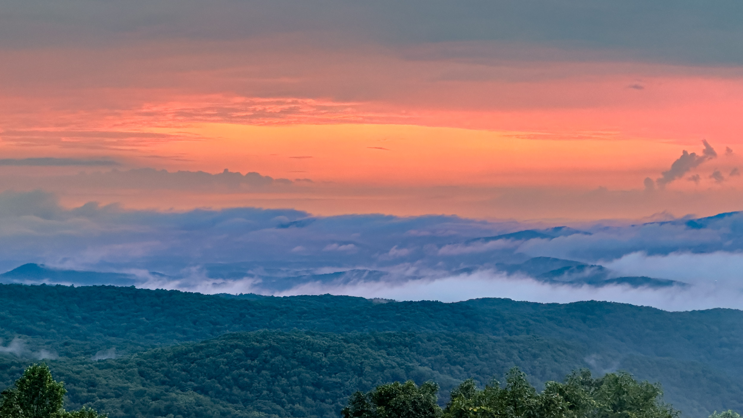 007 2026 07 09 pink dawn over blue ridge fog