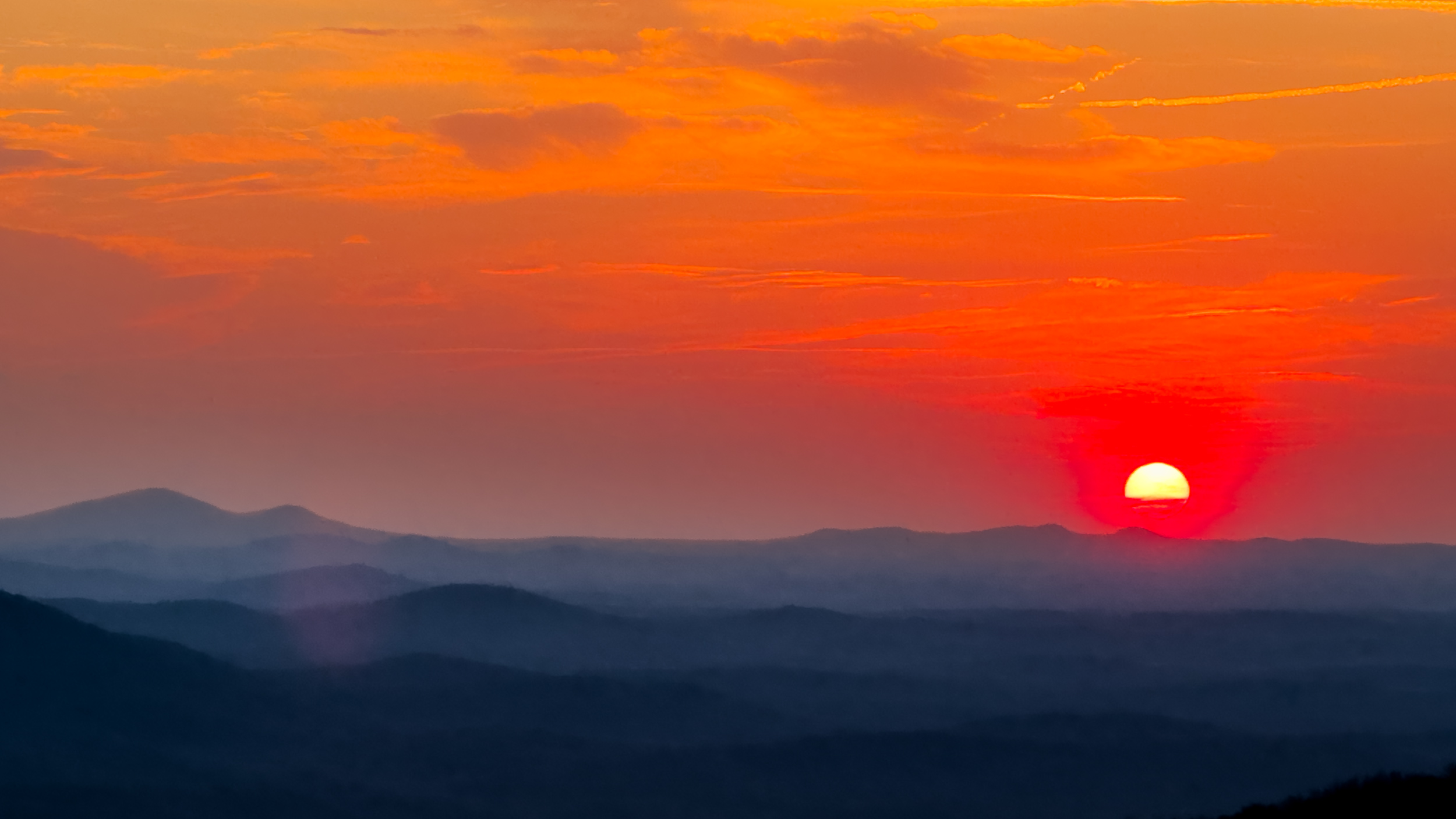 008 2026 03 23 scarlet sun over blue ridge layers