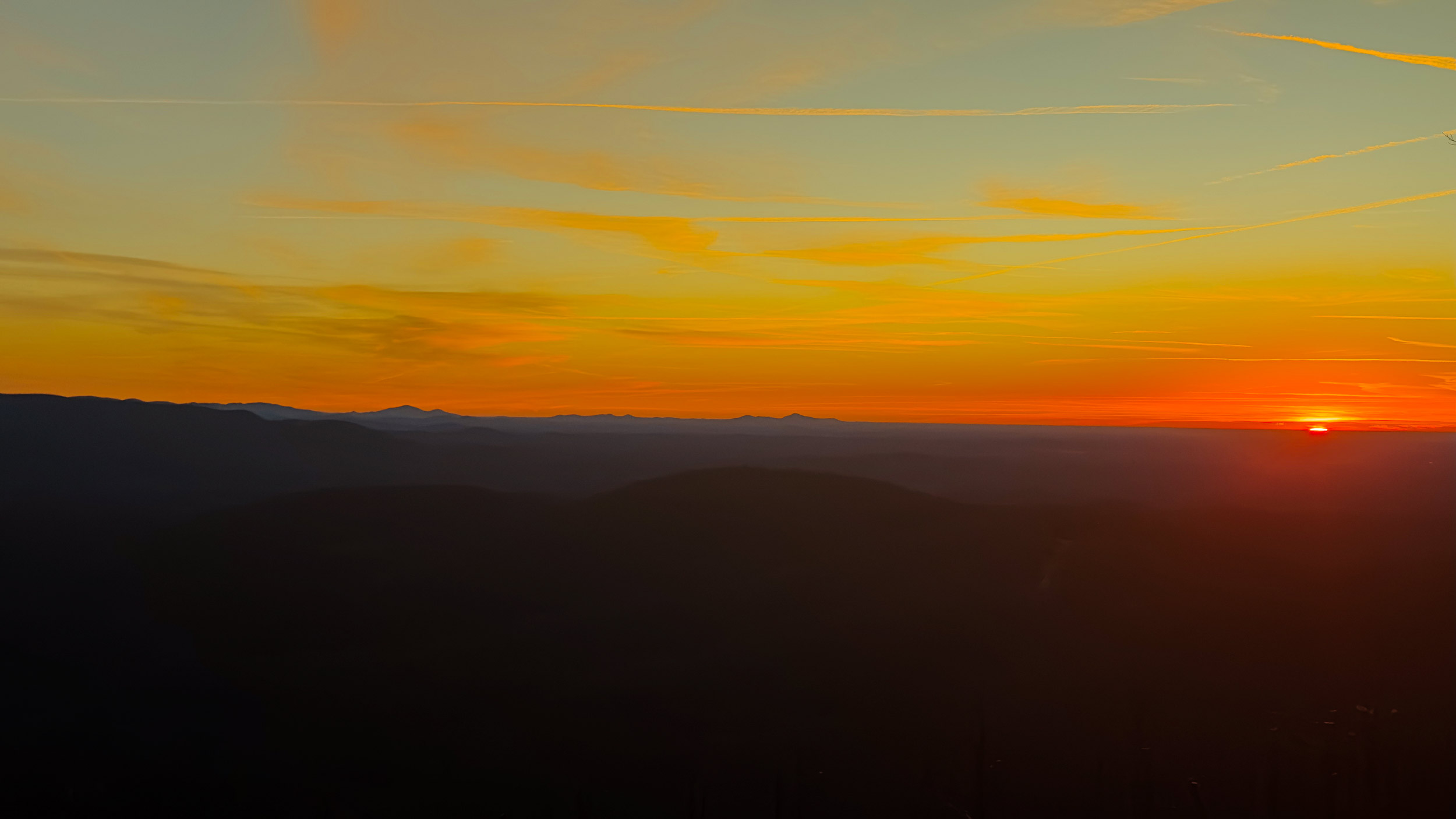 033 2026 01 21 winter sunrise and sky trails over blue ridge